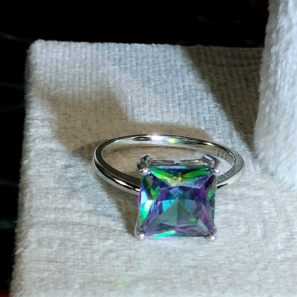 Mystical Silver Ring with Color-Shifting Gemstone